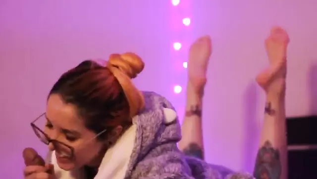 Redheaded girl beautifully sucks the cock of her lover